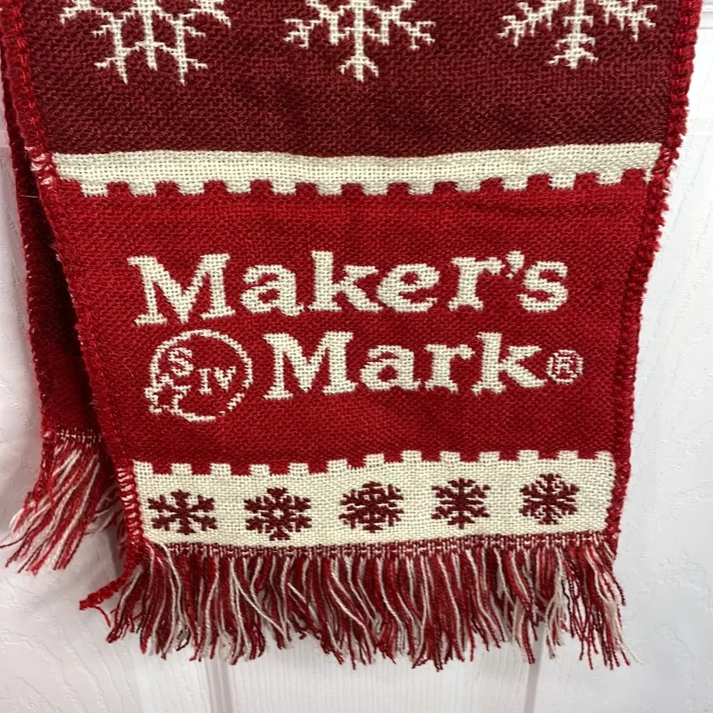 Maker’s Mark red / ivory holiday scarf with snowflakes trees & fringe trim